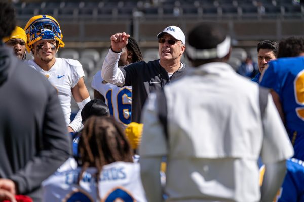 Coach Pat Narduzzi speaks to his players after the Pitt football Blue-Gold Spring Game on Saturday afternoon at Acrisure Stadium.