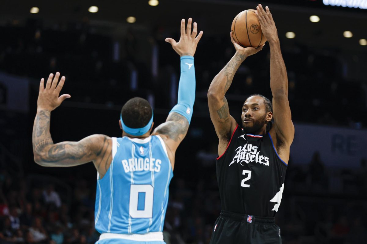 Los Angeles Clippers forward Kawhi Leonard (2) shoots over Charlotte Hornets forward Miles Bridges (0) during the first half of an NBA basketball game in Charlotte, N.C. on Sunday, March 31.