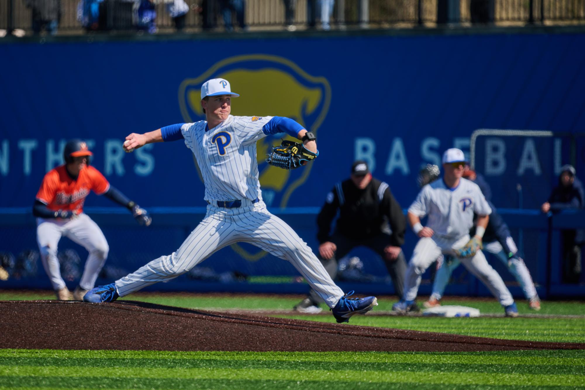 Redshirt sophomore pitcher Phil Fox (28) pitches during a game against UVA at Cost Field on March 25.
