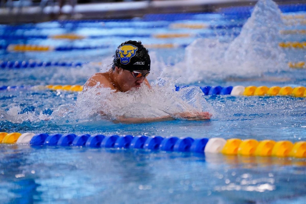 2024 graduate and Pitt swim athlete Jerry Chen competes at a swim tournament.

