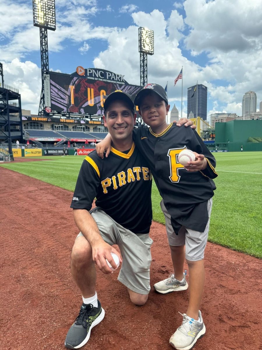 Toren+Mehta+and+his+father+Vinay+Mehta+pose+for+a+picture+on+the+baseball+field+at+PNC+Park+on+Saturday%2C+May+25.%0A