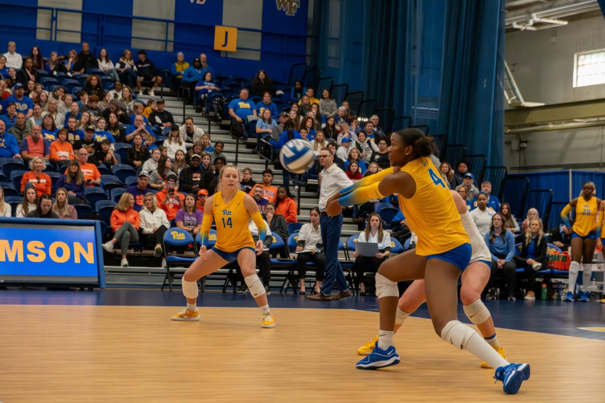 Second year outside hitter Torrey Stafford (4) bumps the ball during the game against Clemson at the Fitzgerald Field House on October 8th, 2023.