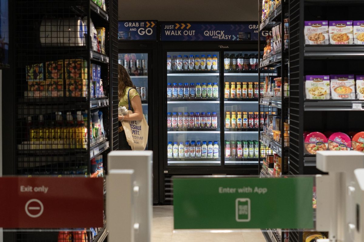 A Pitt student shops in the new “Grab it and Go” store.