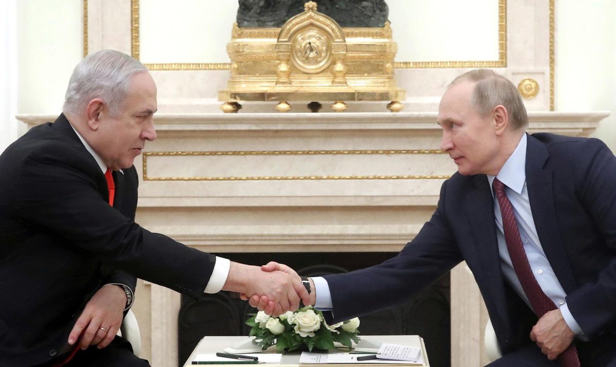 Russian President Vladimir Putin, right, shakes hands with Israeli Prime Minister Benjamin Netanyahu during their meeting in the Kremlin in Moscow, Russia, on Jan. 30, 2020.