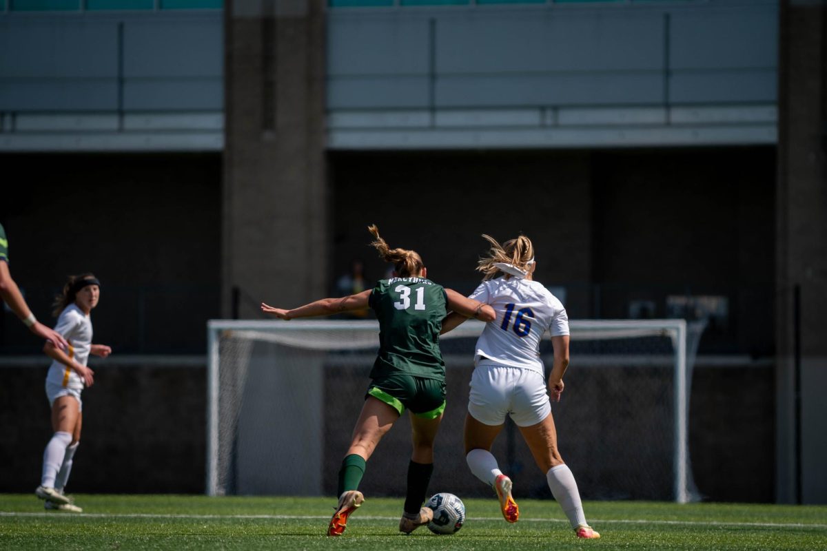 Junior forward Margaret Wilde (16) battles for the ball during Pitt women’s soccer’s game against Mercyhurst on Sunday.