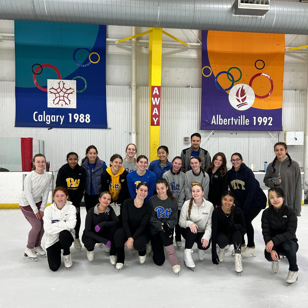 Members of the Pitt Figure Skating Club pose for a photo after a team practice.