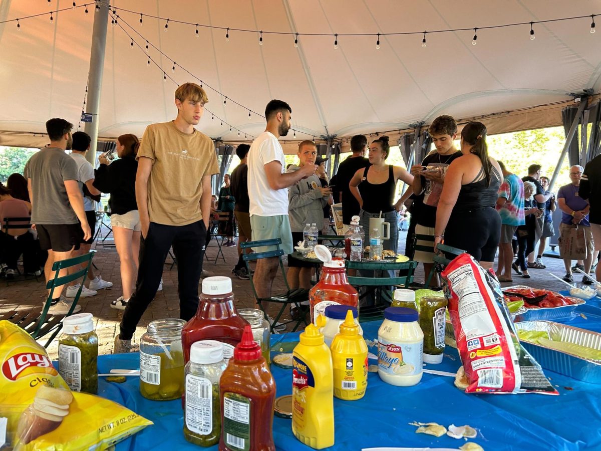 Students enjoy food during the Chabad barbecue at Schenley Plaza on Monday.