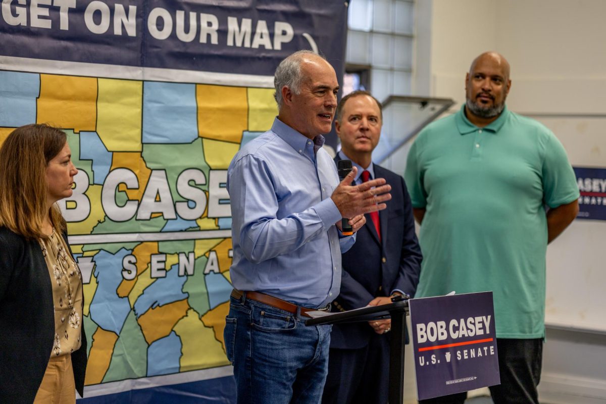 Senator Bob Casey addresses the crowd at a campaign event on public safety and protecting democracy on Sunday.