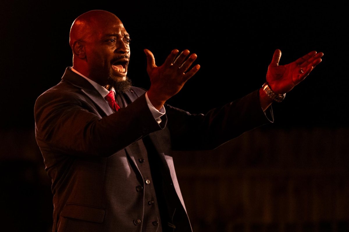 Harmond Wilks speaks passionately at the August Wilson House on Saturday, Aug. 24.