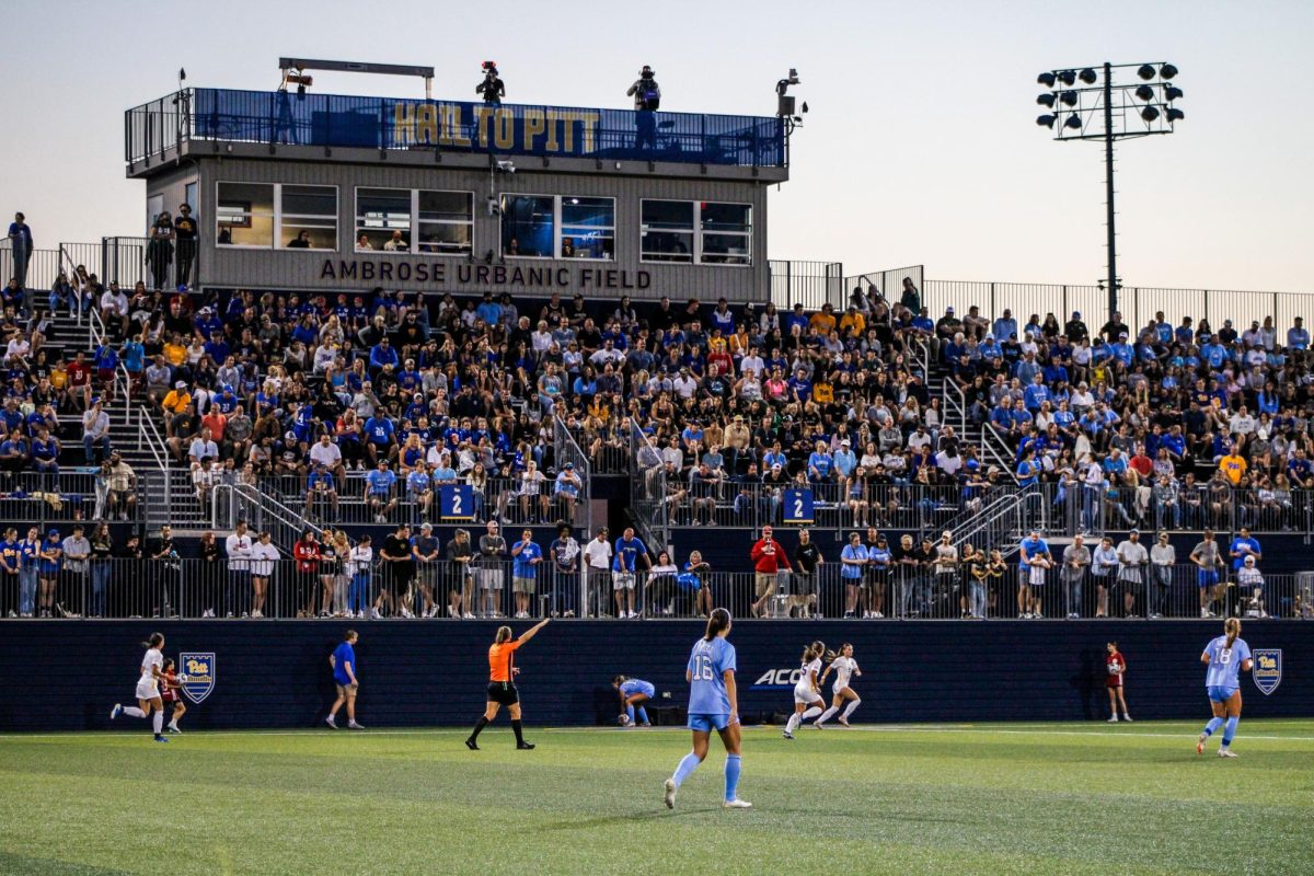 Halle works with a number of Pitt sports teams, including women’s soccer pictured at a game against UNC at Ambrose Urbanic Field.