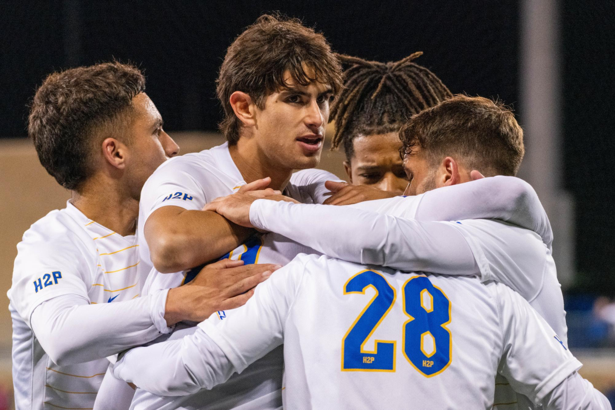 Pitt Panthers celebrate after scoring a goal during a match at the Petersen Sports Complex.
