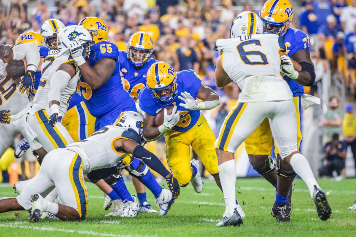 The Pitt Panthers brawl with the WVU Mountaineers at the 2022 Backyard Brawl in Acrisure Stadium.
