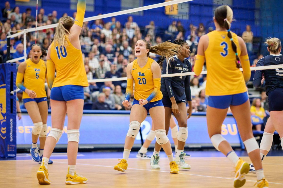 Sophomore middle blocker Bianca Garibaldi (20) celebrates a point during the women’s volleyball game against Penn State on Sunday, Apr. 14, 2024 at the Fitzgerald Field House.