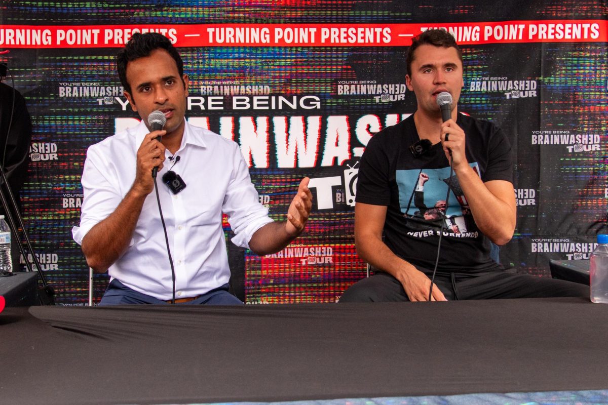 Turning Point USA founder Charlie Kirk and former Republican Presidential Candidate Vivek Ramaswamy respond to a question during TPUSA’s “You’re Being Brainwashed” tour event in the Schenley Quadrangle on Wednesday.