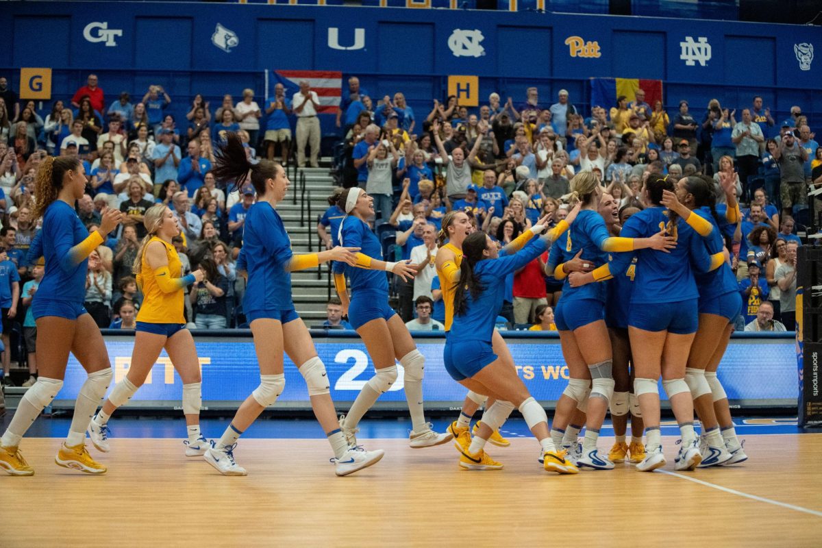 Pitt volleyball celebrates its win against East Carolina at the Fitzgerald Field House on Friday.