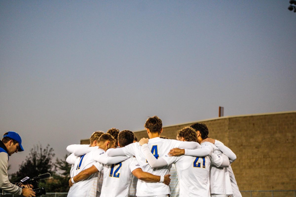 Pitt men's soccer huddles prior to its game against Denver on Monday, Oct. 7 at Ambrose Urbanic Field.