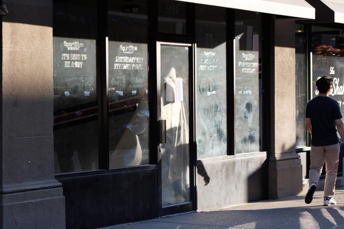 Windows of the storefront where the Super Clips on Forbes Avenue used to be.