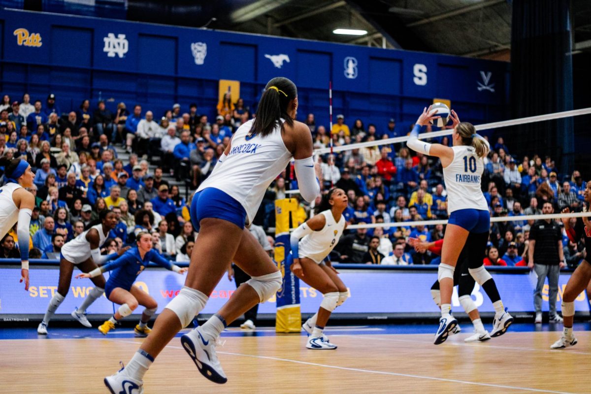 Senior setter Rachel Fairbanks (10) anticipates the ball at the Pitt volleyball game against SMU in the Fitzgerald Field House on Wednesday.