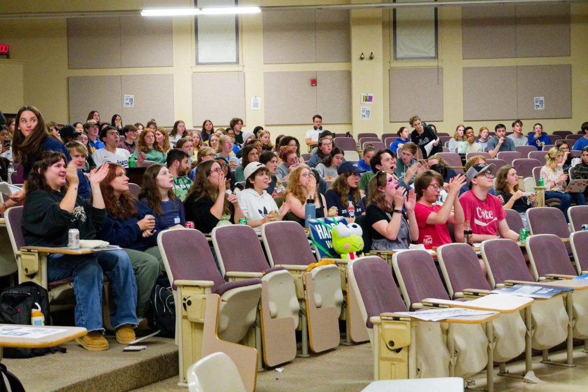 Pitt College Democrats watch the vice presidential debate on Tuesday.