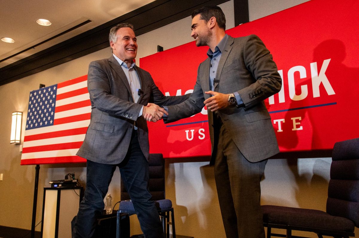 Ben Shapiro and Dave McCormick shake hands during the Fireside Chat with Ben Shapiro and Dave McCormick.