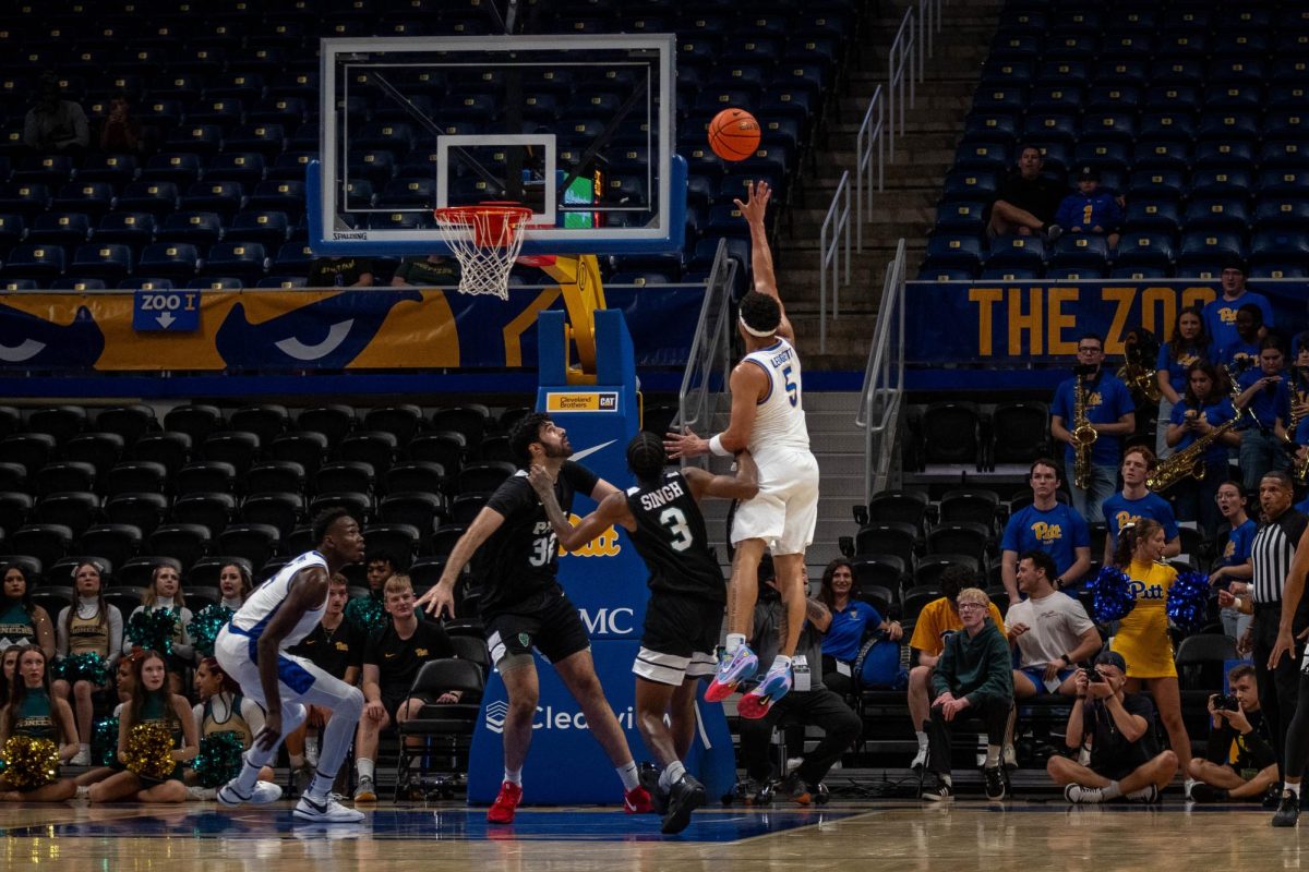 Senior guard Ishmael Leggett (5) shoots the ball during Pitt men’s basketball’s scrimmage at the Petersen Events Center on Tuesday, Oct. 22.