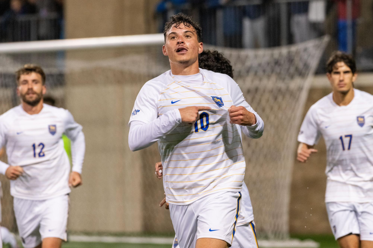 Senior midfielder Guilherme Feitosa (10) celebrates after scoring the first goal during a match at the Petersen Sports Complex.
