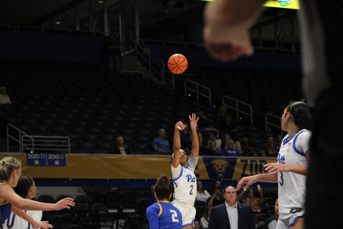 Junior guard Amiya Jenkins (2) shoots the ball at the game against Pitt Johnstown in the Petersen Events Center on Wednesday, Oct. 30. 