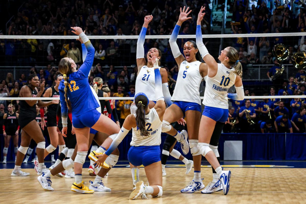 Pitt volleyball celebrates its win against Louisville in the Petersen Events Center on Friday, Oct. 25.