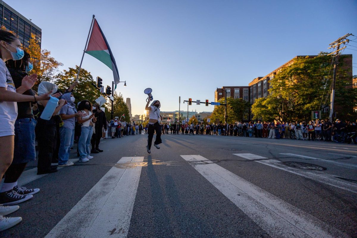 About 250 students, alumni and community members marched in solidarity with Lebanon and Palestine on Thursday evening in a demonstration organized by several pro-Palestinian activist organizations.