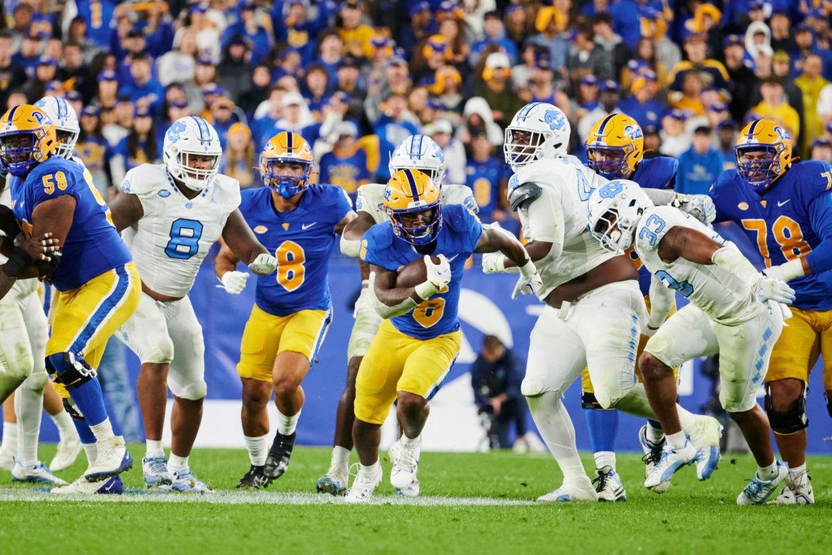 Junior running back Rodney Hammond Jr. (6) runs upfield during last season’s matchup against UNC at Acrisure Stadium.