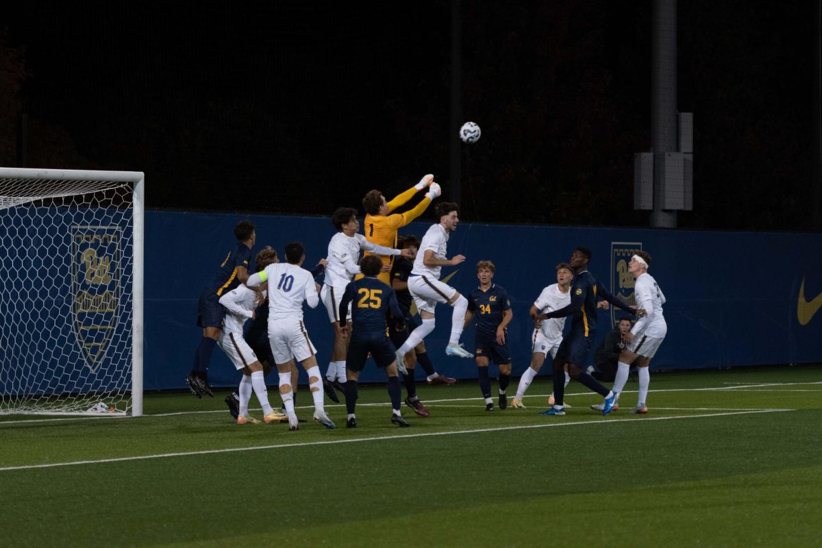 Pitt men’s soccer defends the ball against Cal at the soccer game at Ambrose Urbanic Field on Friday, Oct. 11. 
