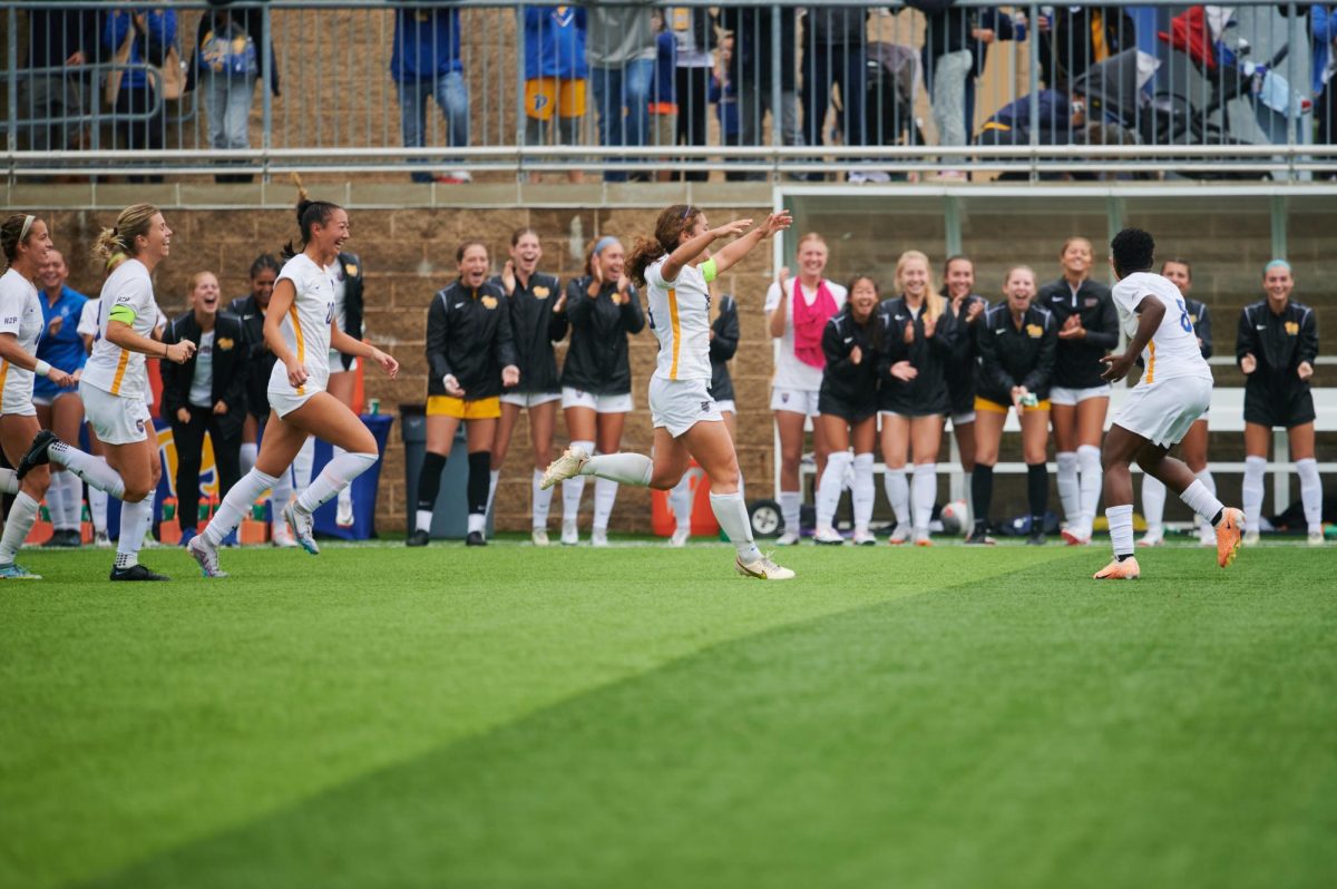 The Pitt women’s soccer team celebrates during a match against Notre Dame on Sept. 24, 2023.