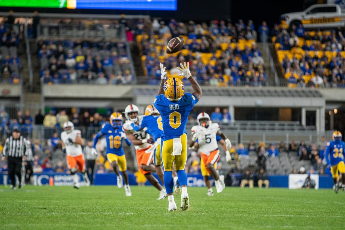 Junior running back Desmond Reid (0) prepares to catch the ball at the Pitt football game against Virginia in Acrisure Stadium on Saturday, Nov. 9.