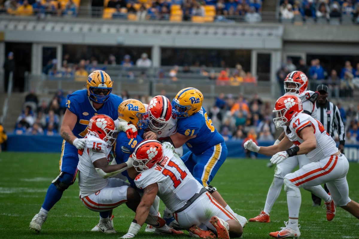 Pitt and Clemson football fight for the ball during the game in Acrisure Stadium on Saturday, Nov. 16.
