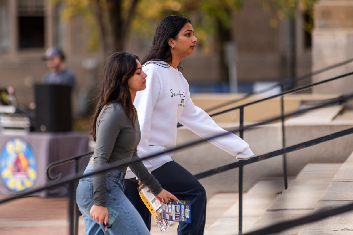 Voters prepare to enter Soldiers and Sailors Museum to vote on Tuesday, Nov. 5.