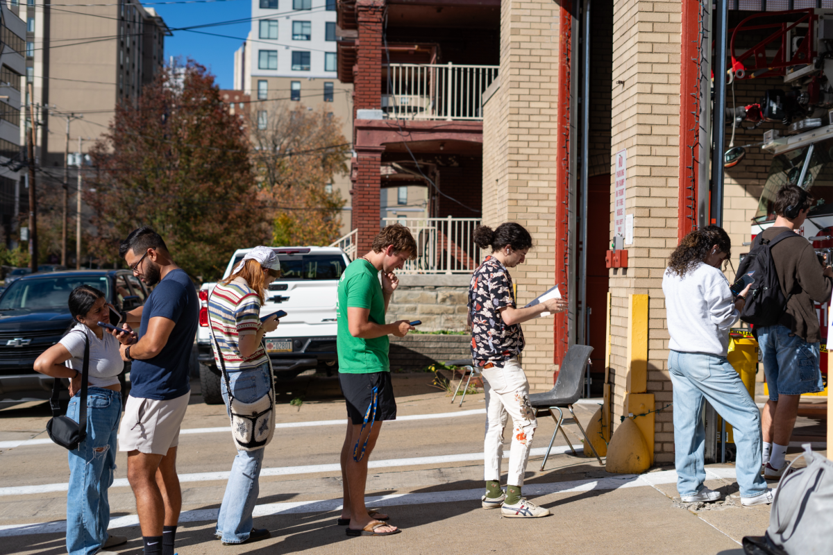 Voters wait outside the Pittsburgh Fire Bureau Station 14 on Tuesday, Nov. 5.