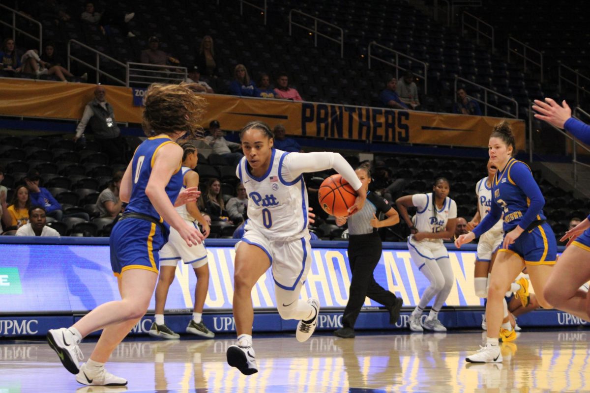 Senior guard Brooklynn Miles (0) drives the ball down the court at the game against Pitt Johnstown in the Petersen Events Center on Wednesday, Oct. 30.