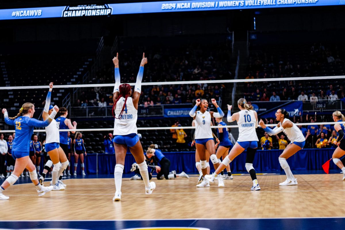 Pitt volleyball celebrates a point during the first round of the NCAA tournament on Friday Dec. 6, 2024 at the Petersen Events Center.