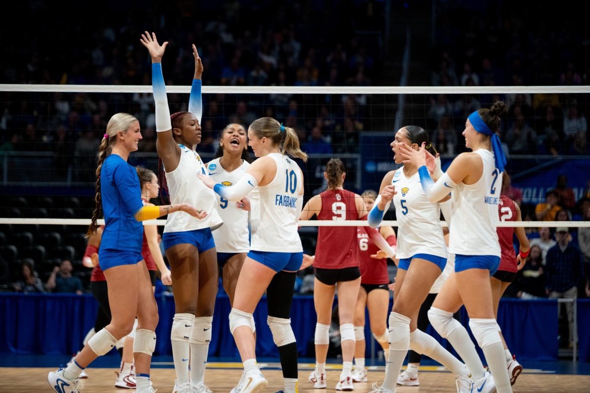 Pitt volleyball celebrates a point during the second round of the NCAA tournament on Saturday Dec. 7th, 2024 at the Petersen Events Center.