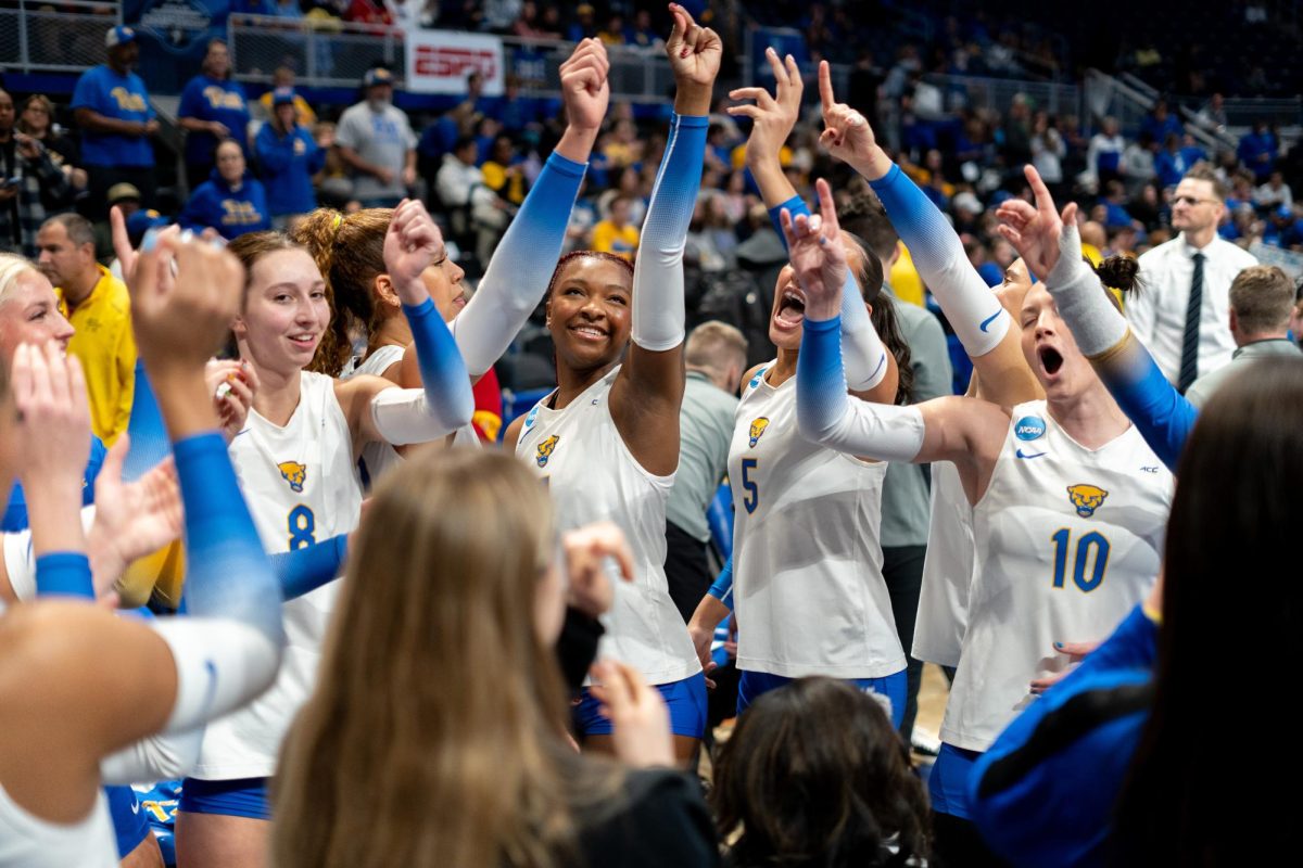 Pitt volleyball celebrates together during their match against Oregon on Thursday, Dec. 12