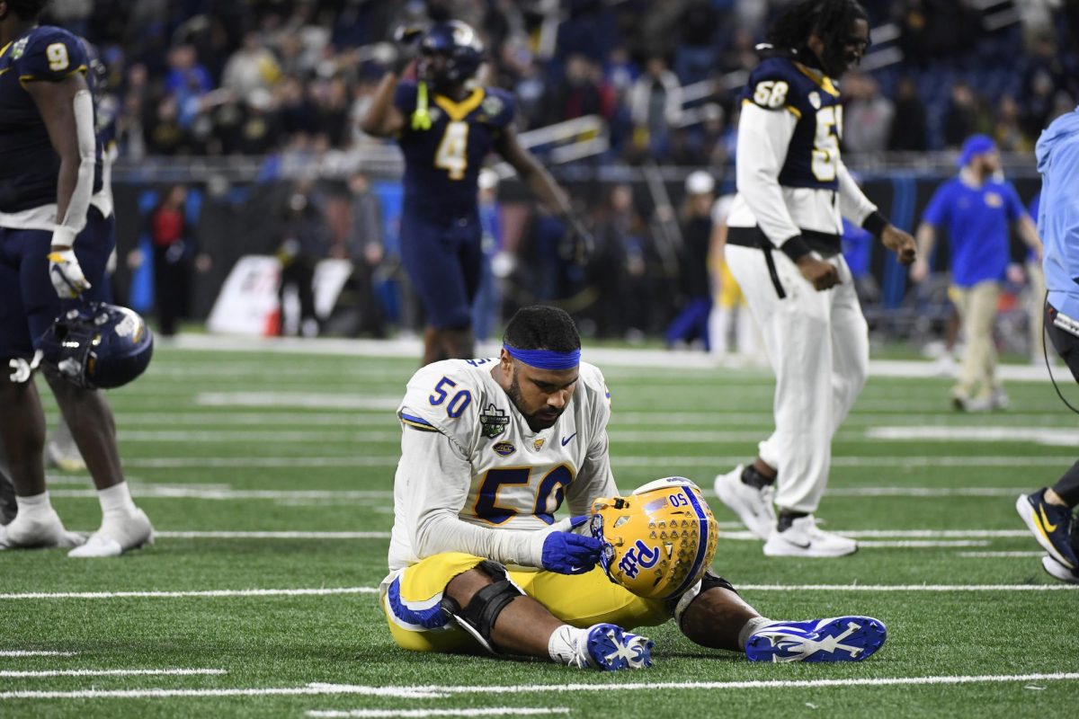 Pittsburgh offensive lineman Jason Collier Jr. (50) reacts after the GameAbove Sports Bowl NCAA college football game against Toledo, Thursday, Dec. 26, 2024, in Detroit.