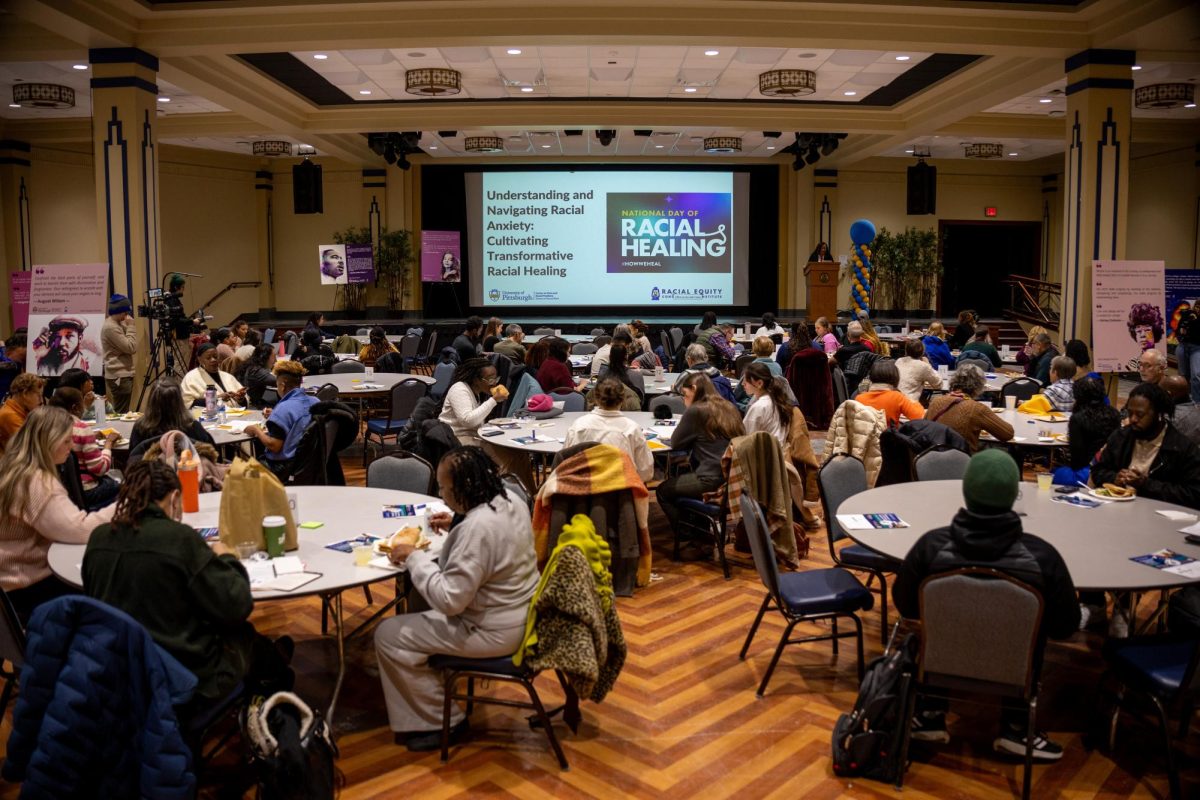 Attendees of the Pitt Racial Day of Healing eat in the William Pitt Union on Tuesday, Jan. 21. 
