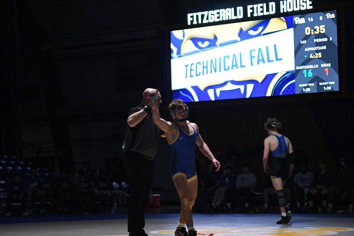 Photos: Pitt wrestling duels Pitt-Johnstown