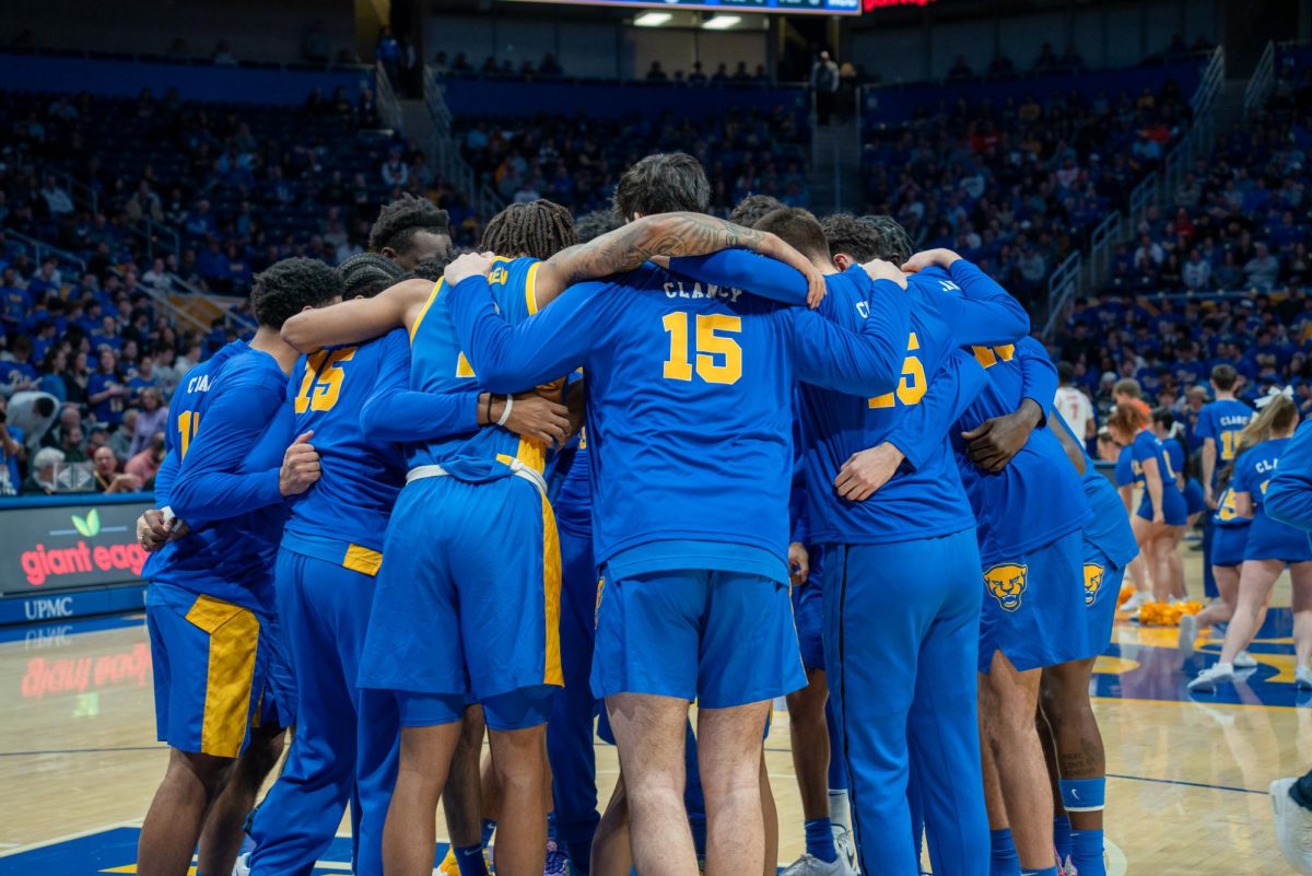 Pitt men’s basketball huddles at the game against Clemson in the Petersen Events Center on Saturday, Jan. 18.
