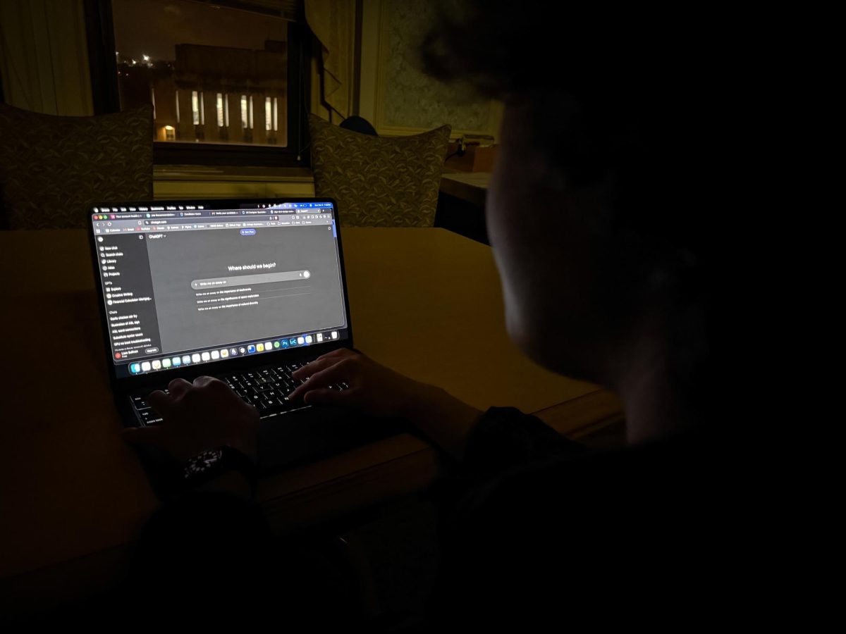 A student types a prompt into ChatGPT.
