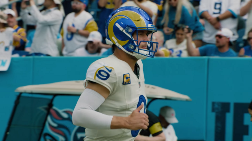 Los Angeles Rams quarterback Matthew Stafford running onto the field for a game against the Tennessee Titans at Nissan Stadium on Sept. 14, 2025.
