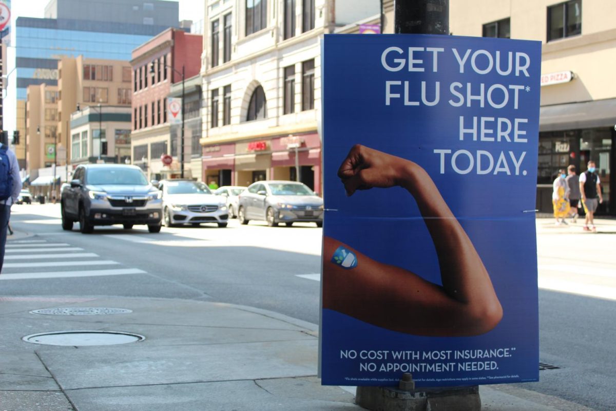 A flier advertising flu shots on Forbes Avenue.