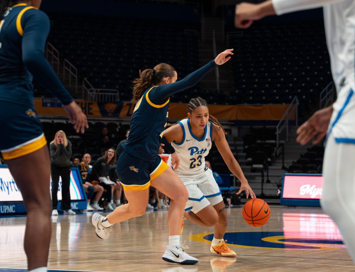 Redshirt junior guard Mikayla Johnson (23) drives the ball during a game against Drexel at the Petersen Events Center on Nov. 4, 2025.
