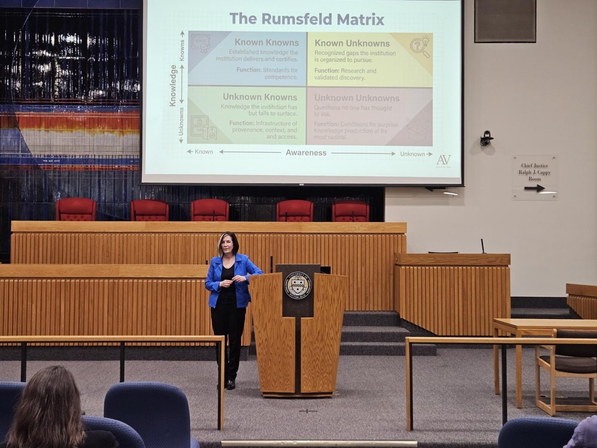 Hollis Robbins gives a lecture in the Barco Law Building on Wednesday.