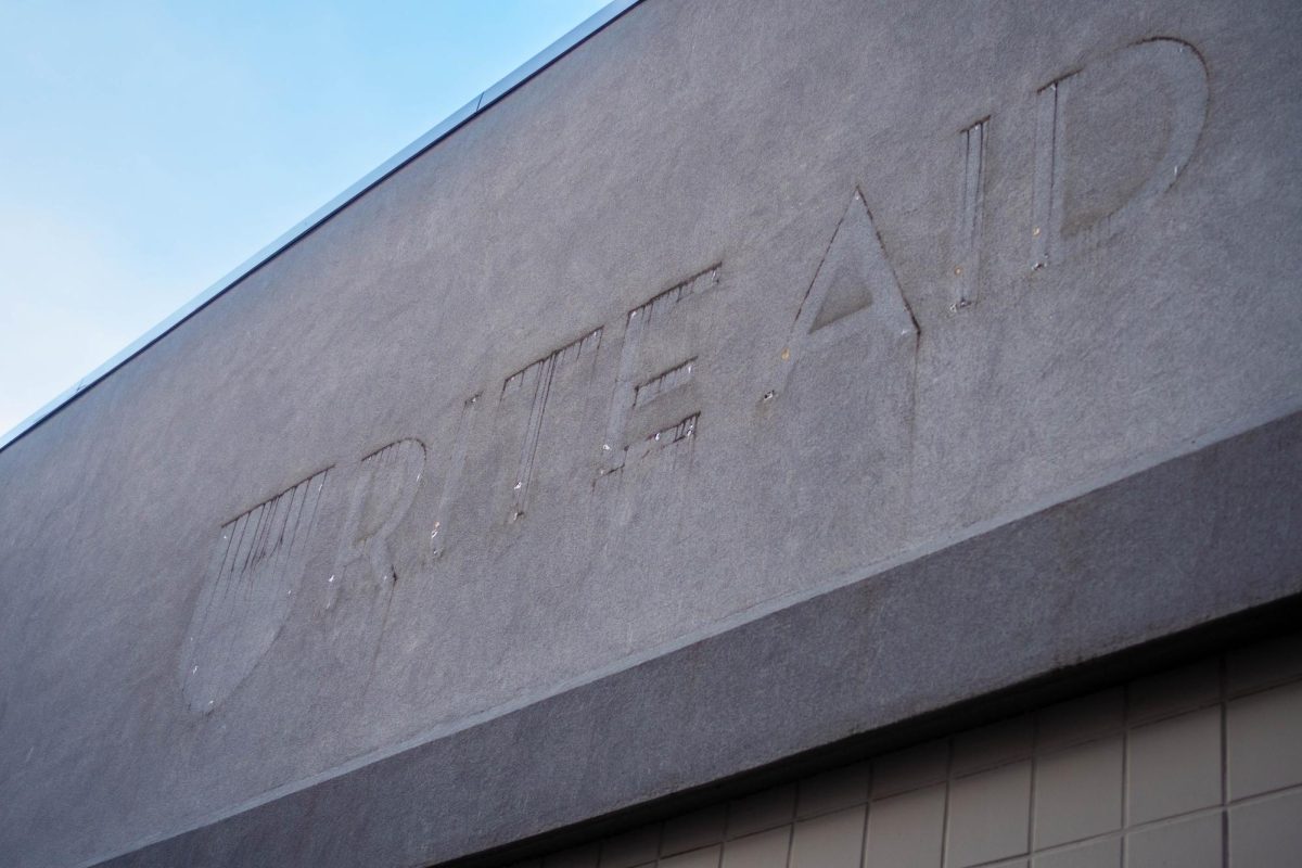 The outline of a Rite Aid storefront sign at 209 Atwood St. in South Oakland.
